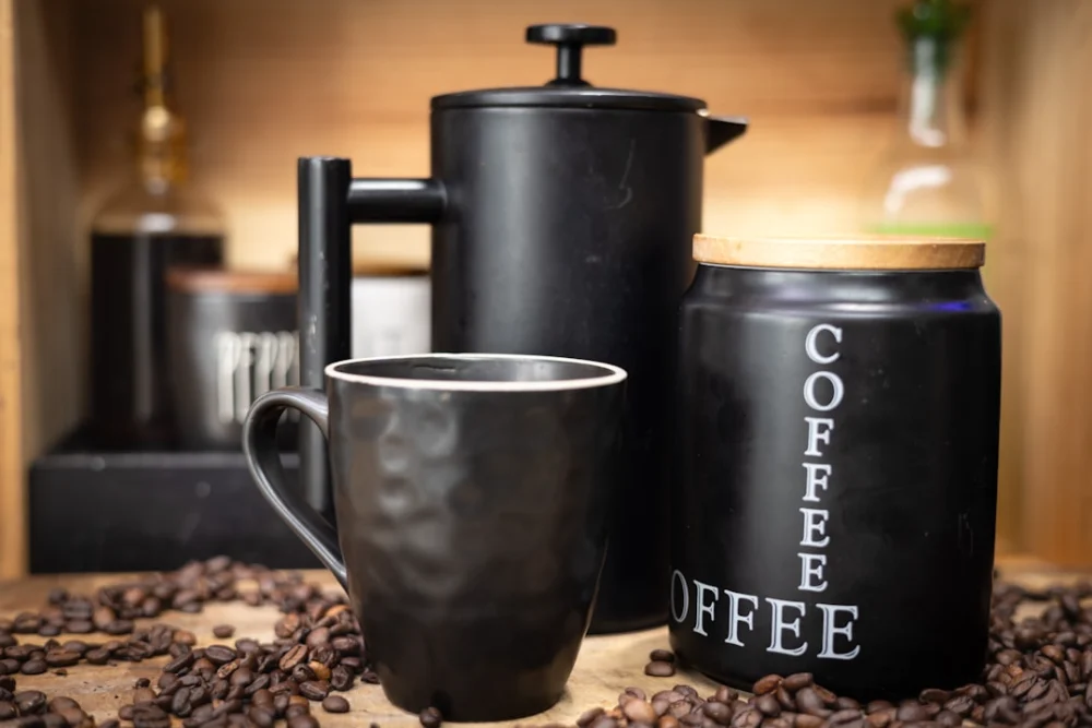 a couple of coffee mugs sitting on top of a table
