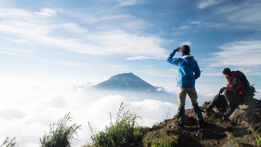 2 men on top of the mountain
